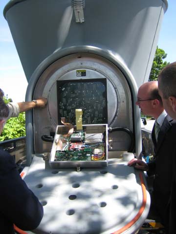 Sonic Wind Profiler: James Hunt III, the city's chief of Environmental and Energy Services, inspects the mechanism of a Triton Sonic Wind Profiler. Photo by Mike Deehan