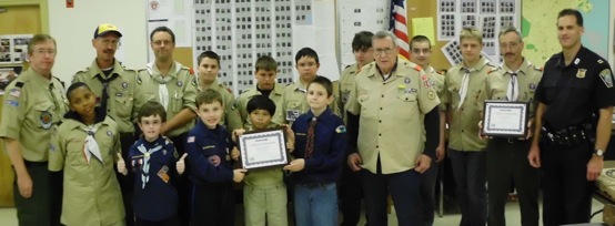 Scouts honor: C-11 police host Dot packs: Pictured top row: Mike Simmons, Pack 28 Committee Chairman, John Anderson Assistant Cub Scout leader, Chris Gross Assistant Boy Scout leader, Scout David Pelczar, Scout Brendan Brock, Scout Cameron Gross, Scout Robert Carney, Scout Alex Sorel, Scou
