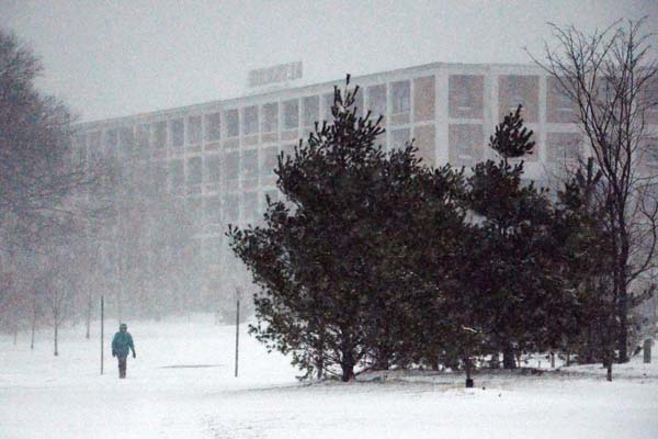 Winter Wanderland: Sunday’s snowstorm— which dumped more than one foot of snow in Boston— did not deter some from venturing onto the Neponset Greenway.  Photo by Chris Lovett