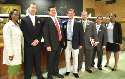 The D3 seven: before Tuesday’s forum at St. Mark’s Church hall: Marydith Tuitt, John O’Toole, Craig Galvin, Doug Bennett, Marty Hogan, Frank Baker and Stephanie Everett. Photo by Pat Tarantino