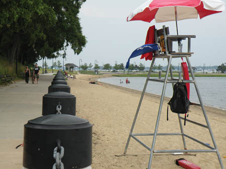 The blue flag flying from the lifeguard station at Savin Hill beach last Thursday indicated that the water was safe for swimming. But Dorchester’s three beaches— Tenean, Malibu and Savin Hill— have yet to draw the summer crowds that are now regularly seen