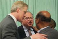 Speaker DeLeo, Councillor Yancey with Rep. Eugene O'Flaherty: The trio huddled in a tense exchange after a community meeting at the Lee School last week. Image courtesy Mike Deehan/SHNS