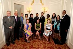 Boston’s Educators of the Year: (seated from left) Emily Bozeman, Brighton High School, Amy Gailunas, Dr. William W. Henderson Inclusion Elementary School, and Jayme Drzewinski, Thomas Edison K-8 School; Standing from left: Richard Stutman, Boston Teachers Union, Mayor Thomas Menino, Clifford Tetle, Oliver Wendell Holmes Elementary School, Dora Yu, Charlestown High School, Rosemary George White Henry Dearborn Middle School, Harry “Chuck” Gilliam, Richard J. Murphy K-8 School, Gregory Holt, Boston Arts Academy, Patricia Flakes, Madison Park Technical Vocational High School, Jennifer Muhammed, Joseph Hurley 2-Way Bilingual K-8 School, Superintendent Carol Johnson, and Rev. Gregory G. Groover Sr., Boston Public Schools Committee Chairman.