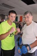 Like father, like son: Gerry Grealish, left, and his father Martin Grealish pack a one-two training punch at their family’s Freeport Street gym. 	Photo by Bill Forry
