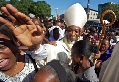 Cardinal Chibly Langlois in Boston: The scene outside Mission Church on Sunday. Photo by Joel Jean-Pierre