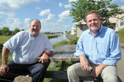 John McLaughlin, president of the Dorchester-based Sullivan  &amp;amp;amp; McLaughlin Companies, is pictured, left, with the company’s executive vice president John Rudicus. 	Bill Forry photo