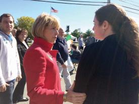 Coakley: Martha Coakley speaks with Colleen Mason, a pre-K teacher, at the Irish Heritage Festival on Sunday morning.  	Photo by Lauren Dezenski