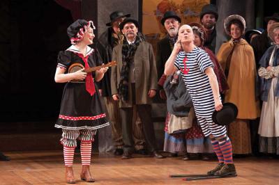 Happenstance Theater’s Mark Jaster and Sabrina Selma Mandell are featured in a scene from Christmas Revels, now playing at Harvard’s Sanders Theatre. Roger Ide photo