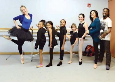 Urban Nutcracker performers include (l-r) Kseniya Melyukhina, Hope Williams,  Isis Pichardo, Kyre Ambrose,  Echo Kirke-Sofer,  Ella Moye-Gibbons, Guenevir Pichardo, and tap star Khalid Hill. The six children are all from Dorchester.