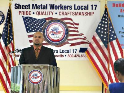 Graduate speaker Freddie Rivera addressed classmates and guests at the Building Pathways Graduation on August 7. James Hobin photo