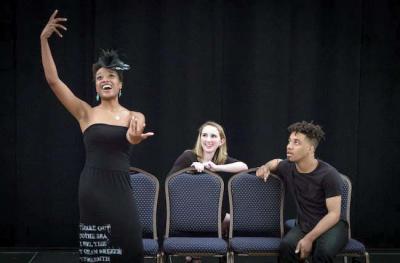 Cast members in “A Crack in the Blue Wall”include (left to right) Maya Carter, Emily Sheeran, and Derek Jackson.  Renford Lee photo