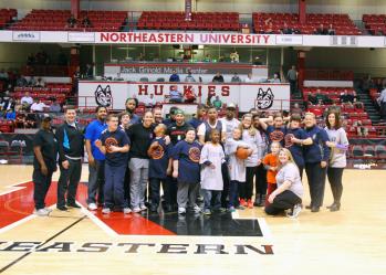 Members of the Boston Police Dept. joined participants from the Martin Richard Challenger Basketball program at the Boys &amp;amp;amp; Girls Clubs of Dorchester as the guests of Northeastern University where they played at half-time.