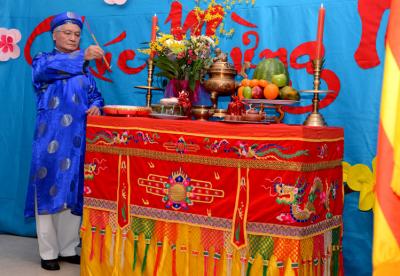 Celebrating Tet in Fields Corner: Trương Trọng Nghĩa, an employee at VietAid and Producer of VietAid Community Television program, during last Saturday’s Tet celebration in Fields Corner. Simon Phu photo