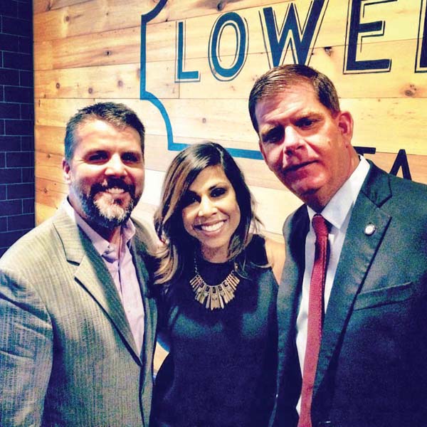 Welcome to the neighborhood: Lower Mills Tavern owner Brian O’Donnell and his wife, designer Taniya Nayak, are shown with Mayor Martin Walsh, who visited the new restaurant for a private event last week. The eatery opens to the public on May 31.  Photo courtesy Lower Mills Tavern