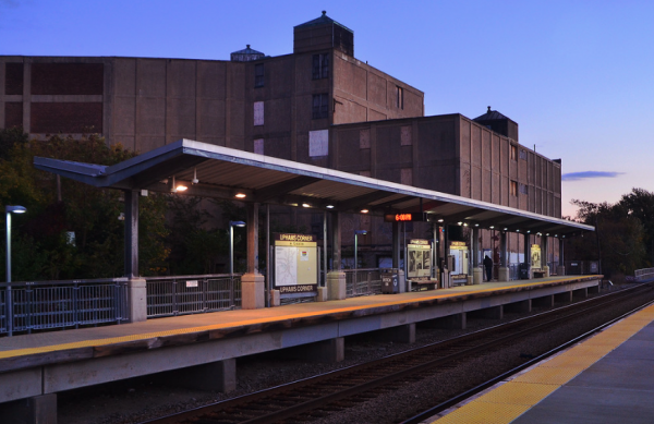 Uphams Corner: The Fairmount Line has spurred some new development along its route. The Leon Electric building, which hulks over the Uphams Corner station platform, has not yet been unlocked for redevelopment, however. Photo by Chris Lovett
