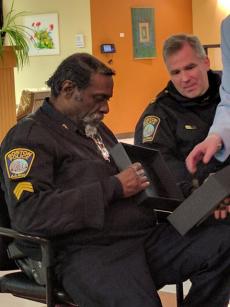 Sgt. John Burns: Fields Corner civic leaders presented the longtime C-11 officer with a small gift on Tuesday.