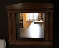 A pass-through nook connects the kitchen and dining room