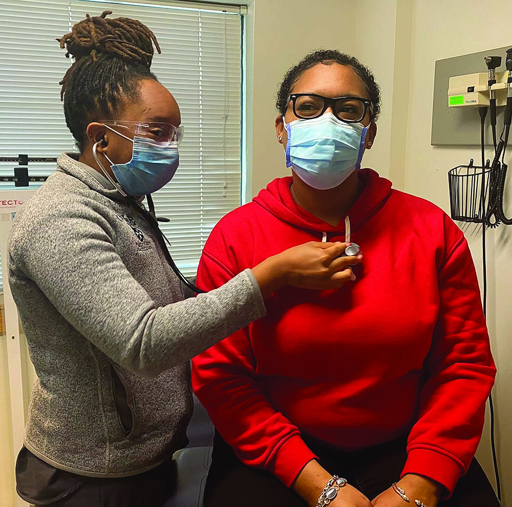 codman nurse Nnemdi and patient REP 46-20.jpg