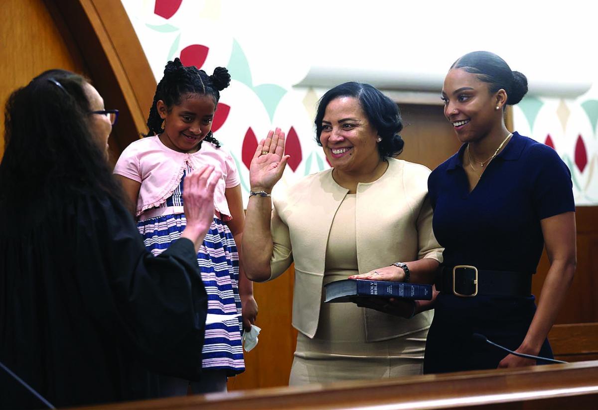 p12 NEW Rollins sworn into office REP 17-22.jpg