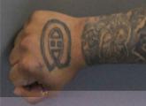 Correia's C tattoo