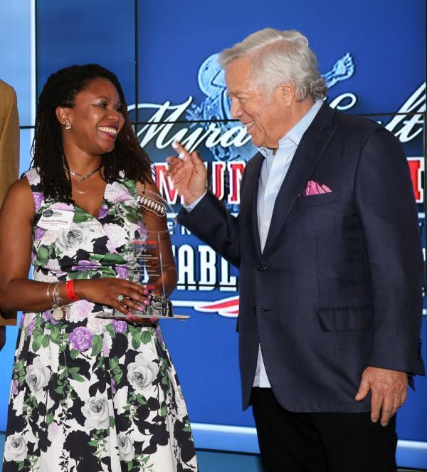 Fabienne Eliacin, left, with Robert Kraft